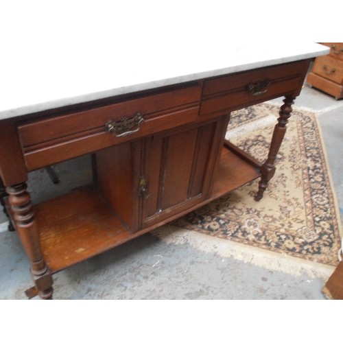 446 - EDWARDIAN AMERICAN WALNUT WASH STAND. WITH MARBLE TOP. 2 DRAWERS AND CENTRAL CUPBOARD. 107CM W.