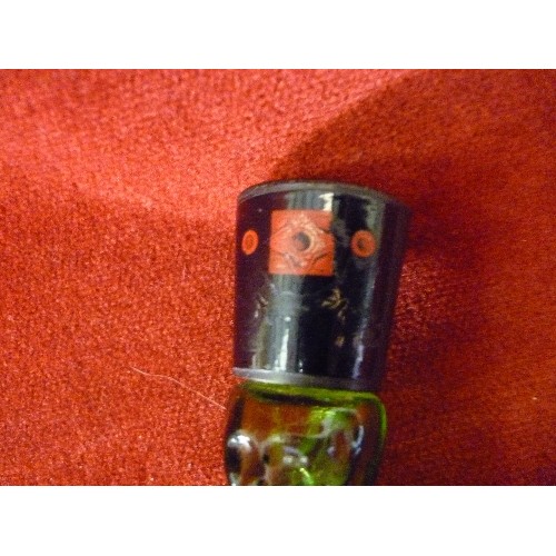 159 - A GREEN GLASS SCENT/LIQUER BOTTLE IN THE SHAPE OF A SOLDIER - PROBABLY AVON