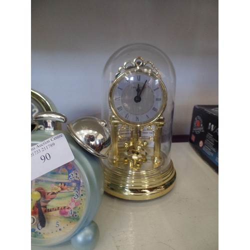 90 - 4 X ALARM CLOCKS, AND A CARRIAGE CLOCK. INC A RETRO POOH BEAR CLOCK, AND A WESTCLOX.