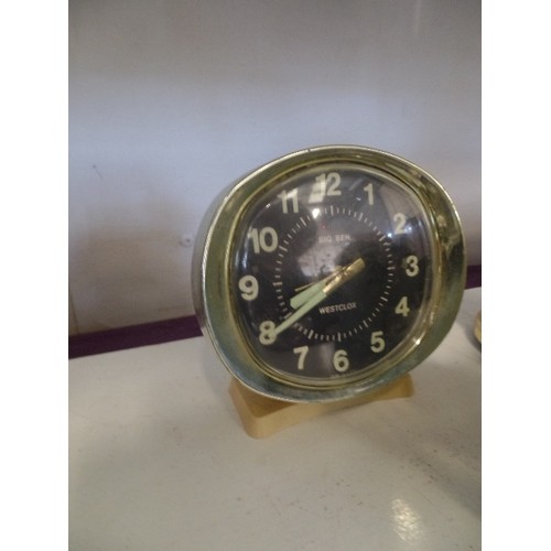 90 - 4 X ALARM CLOCKS, AND A CARRIAGE CLOCK. INC A RETRO POOH BEAR CLOCK, AND A WESTCLOX.