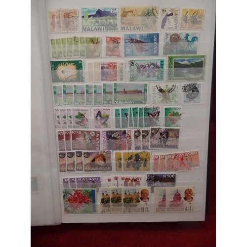 94 - 2 X VINTAGE STAMP STOCK -BOOKS. TOGETHER WITH A LARGE STAMP ALBUM. BOOKS CONTAIN MULTIPLE STAMPS..