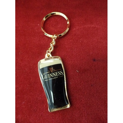 100 - QUANTITY OF GUINNESS BRASS/ENAMEL KEY-RINGS. BRAND-NEW/PACKAGED.