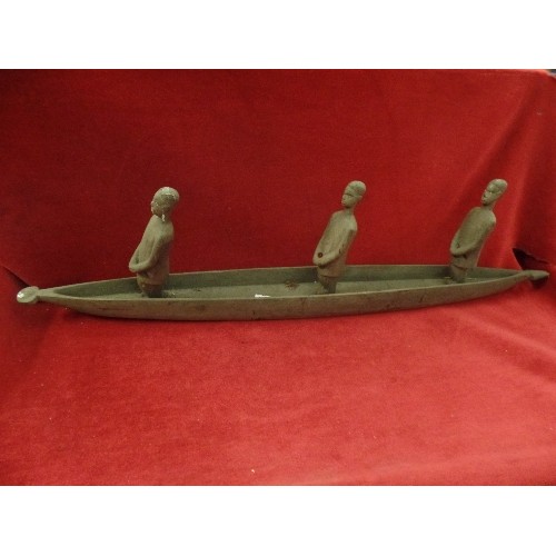 155 - VINTAGE CRUDELY CARVED AFRICAN 3 MEN IN A WOODEN BOAT. APPROX 76CM L