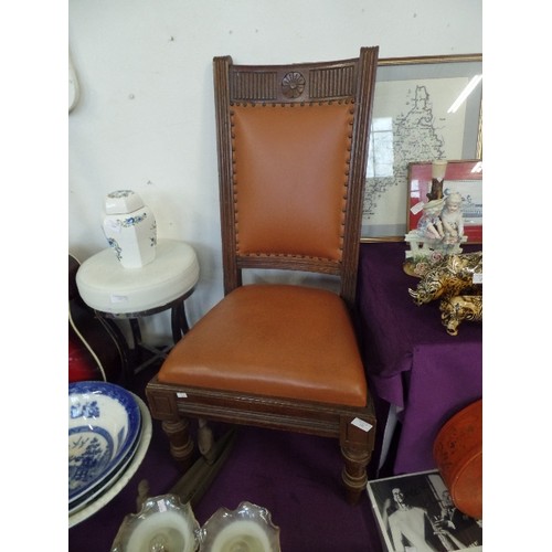 151 - UNUSUAL DESIGN VINTAGE OAK-FRAMED CHAIR, WITH FAUX LEATHER CARAMEL PADDED SEAT & BACK.