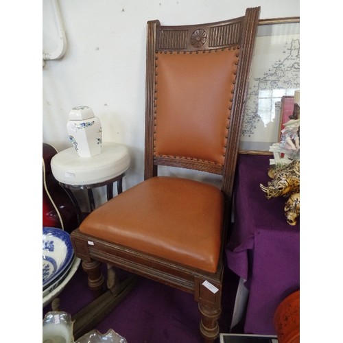 151 - UNUSUAL DESIGN VINTAGE OAK-FRAMED CHAIR, WITH FAUX LEATHER CARAMEL PADDED SEAT & BACK.