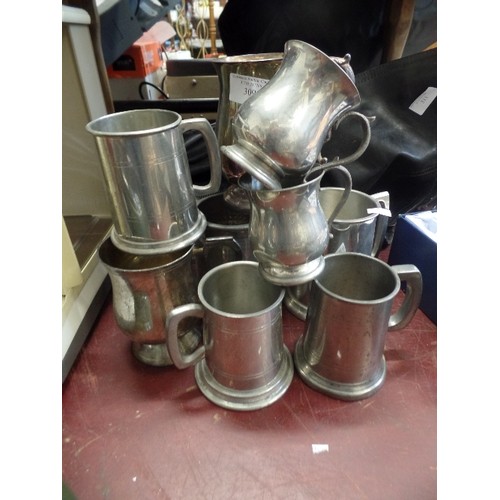 309 - 9 X VINTAGE PEWTER TANKARDS.