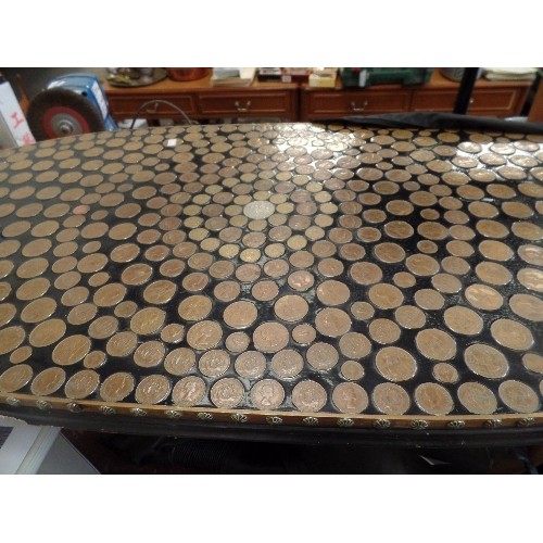 305 - UNUSUAL OVAL COFFEE TABLE, TOPPED WITH COPPER- 1 CROWN/ THREEPENNY BITS/ I/2P/ 2P/1P COINS SET IN RE... 