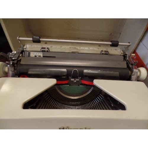 320 - RETRO-VINTAGE PORTABLE OLYMPIA TYPEWRITER. IN VINYL CARRY CASE