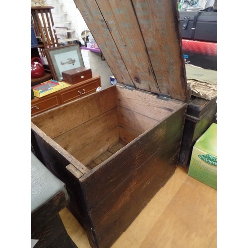 379 - CRUDELY MADE VINTAGE WOODEN STORAGE BOX/SEAT. 44CM.W. HINGED LID.