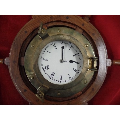 392 - VINTAGE 'SHIP'S WHEEL' CLOCK. WOOD/BRASS SURROUND.