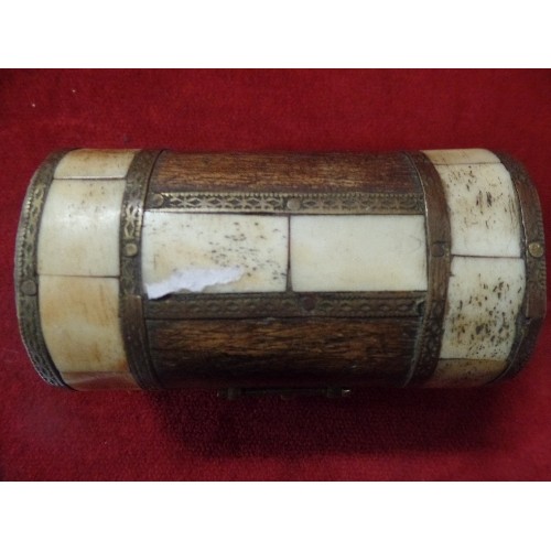 27 - INDIAN WOODEN DECORATIVE TRINKET BOX IN SHAPE OF TREASURE CHEST WITH CONTENTS OF BELLY BUTTON BARS