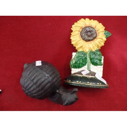 397 - 2 X HEAVY CAST IRON GARDEN ITEMS. A LOVELY SNAIL, AND A PAINTED SUNFLOWER.