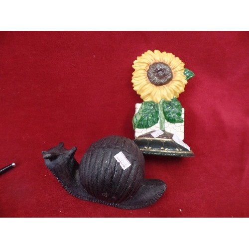 397 - 2 X HEAVY CAST IRON GARDEN ITEMS. A LOVELY SNAIL, AND A PAINTED SUNFLOWER.