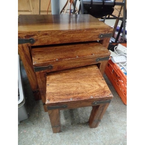 518 - NEST OF POLISHED JALI-WOOD TABLES. IRON BRACKETS AND STUDS.