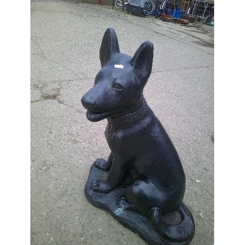 629 - HEAVY LARGE CONCRETE GARDEN ORNAMENT OF A ALSATION PUPPY PAINTED BLACK 63CM OR 2`1