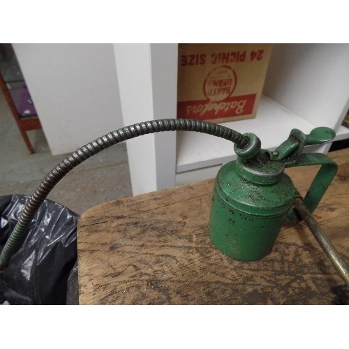 603 - OIL CAN AND A GREASE GUN.