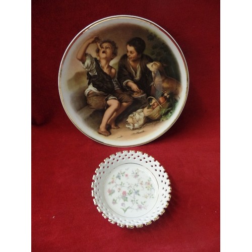 114 - 2 X DECORATIVE PLATES, A BAVARIAN GEOGENSUD PLATE '2 BOYS WITH DOG' AND A PRETTY FLORAL BON-BON LATI... 