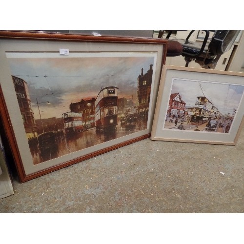 150 - TWO FRAMED/ GLAZED PRINTS OF TRAMS IN CITY STREET SCENES, THE LARGEST  - 90CM X 65CM