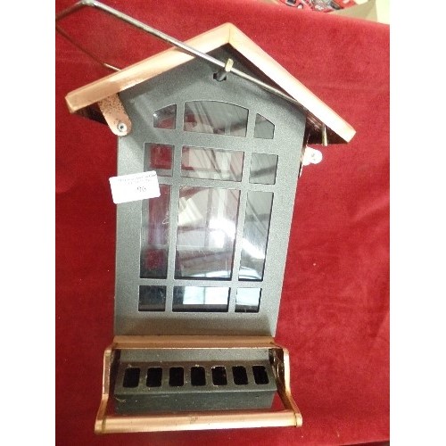 96 - METAL BIRD FEEDER WITH COPPER ROOF.