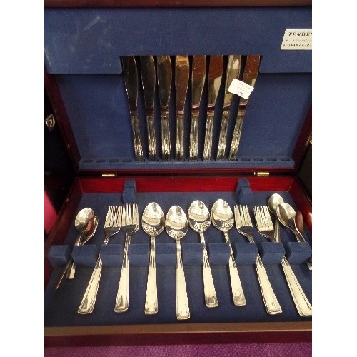 108 - TENDENCE CANTEEN OF CUTLERY. 18/10 STAINLESS. IN WOODEN CASE.