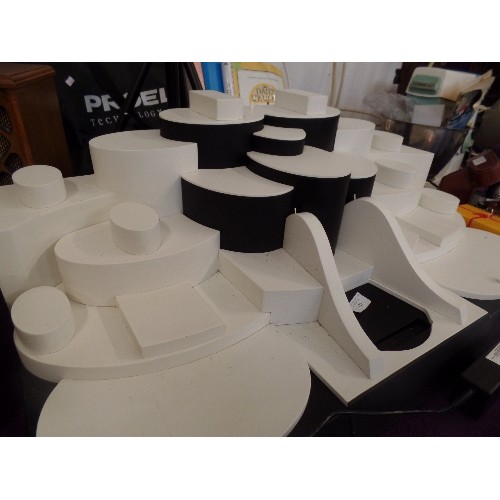 123 - LARGE JEWELLERY RETAILERS DISPLAY STAND. IVORY AND BLACK PODS, FORMS AND SURFACES FOR DISPLAY PURPOS... 