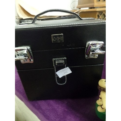 132 - GEL NAIL KIT, BOTTLES CONTAINED IN BLACK SMART FAUX LEATHER OPI CASE.