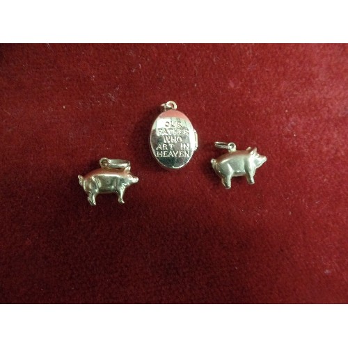 14 - 9CT GOLD PHOTO LOCKET PLUS TWO CHARM BRACELET PIGS WEIGHT 2.46 GR