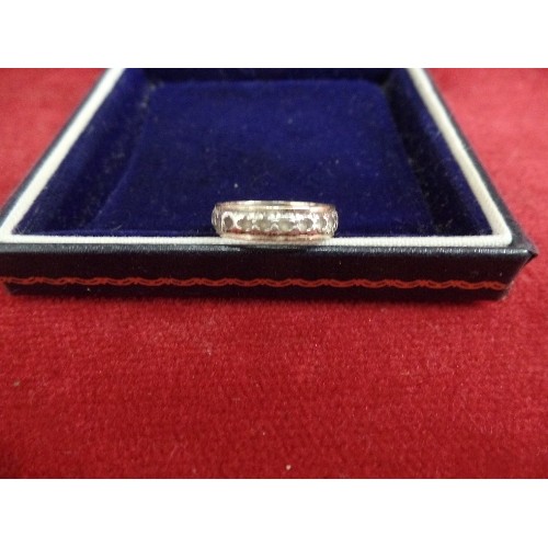 18 - AN ETERNITY RING GOLD AND SILVER WITH WHITE STONES UNMARKED SIZE M WEIGHT 2.88 GR