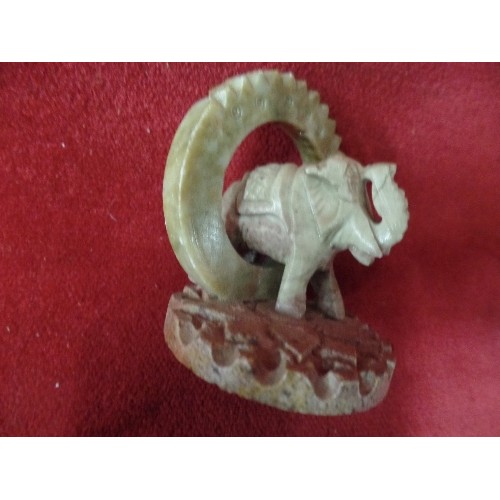 4 - SOAPSTONE TRINKET BOX WITH ROSE DECORATION. SOAPSTONE ELEPHANT WALKING THROUGH A RING AND A RESIN MO... 