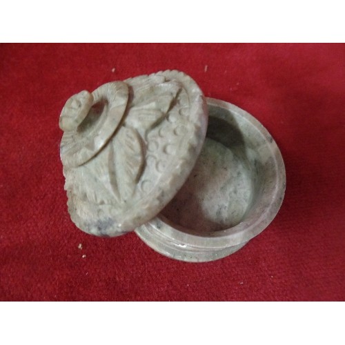 4 - SOAPSTONE TRINKET BOX WITH ROSE DECORATION. SOAPSTONE ELEPHANT WALKING THROUGH A RING AND A RESIN MO... 