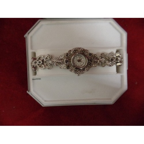 34 - LADIES DECORATIVE SILVER METAL WATCH