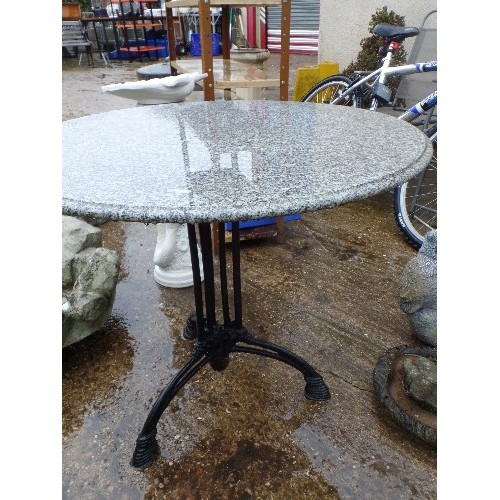 581 - CAST IRON AND MARBLE TOP GARDEN TABLE