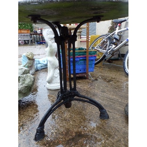 581 - CAST IRON AND MARBLE TOP GARDEN TABLE