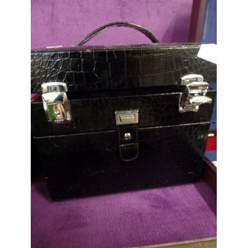 87 - 2-TIER GEL NAIL KIT CASE, BLACK MOC CROC CASE CONTAINS QUANTITY OF GEL NAIL POLISH.