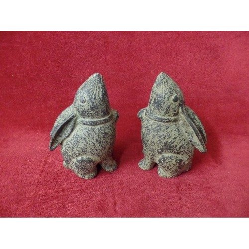 81 - A PAIR OF HEAVY CAST METAL HARES/RABBITS.