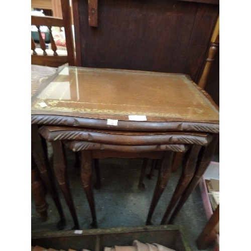 201 - NEST OF 3 MAHOGANY TABLES, WITH GLASS COVERED BROWN LEATHER TOPS.