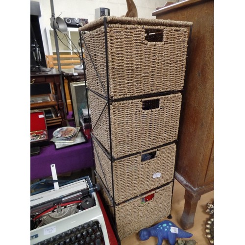 217 - TALL 4 DRAWER RATTAN TOWER. CHOC FULL OF BATHROOM AND FIRST-AID ITEMS.