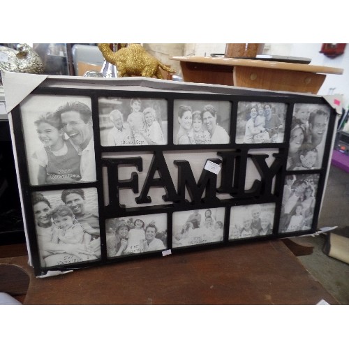 272 - MULTI-APERTURE PHOTOGRAPH FRAME. BLACK, WITH THE WORD 'FAMILY' AT THE CENTRE.