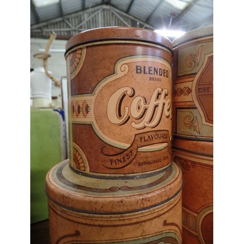 291 - 4 X VINTAGE TIN CANNISTERS IN GRADUATED SIZES. FLOUR, SUGAR, COFFEE AND TEA.