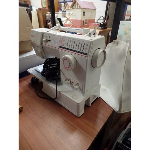 357 - ELECTRIC SINGER 9020 SEWING MACHINE. WITH ZIG-ZAG & FANCY STITCH FACILITY.