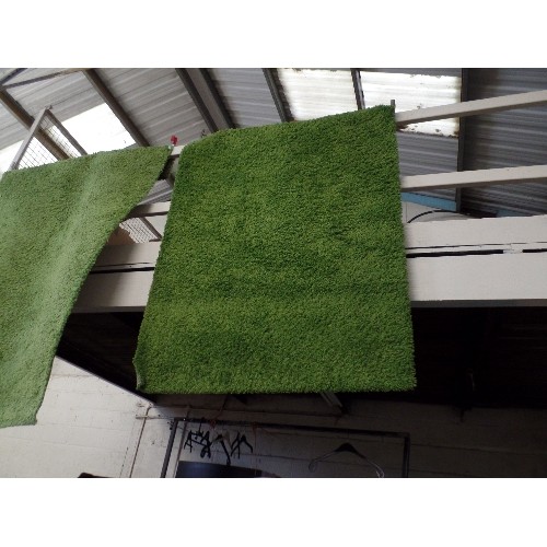 152 - A VERY LARGE 'GRASS-GREEN' RUG. TOGETHER WITH A SLIGHTLY SMALLER MATCHING ONE. GOOD CLEAN CONDITION.