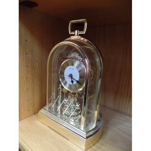 379 - A 'BRASS EFFECT' CARRIAGE CLOCK, AND A SMALL NELSONS HAT MANTEL CLOCK.