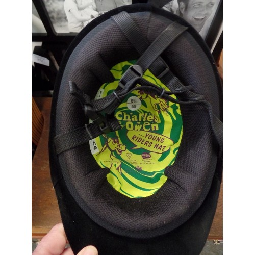 292 - HORSE RIDING LOT. CHARLES & OWEN. YOUNG RIDERS VELVET SAFETY HAT. 55/ 6 & 3/4. APPEARS NEW CONDITION... 