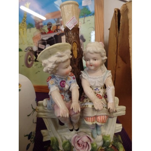 106 - GIRL AND BOY SITTING ON FENCE FIGURE AND A ORIENTAL GINGER JAR