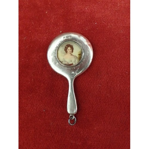 16 - EDWARDIAN MINIATURE STERLING SILVER CHATELAINE MIRROR, THE BACK WITH AN INSET PANEL OF A LADY -BIRM ... 