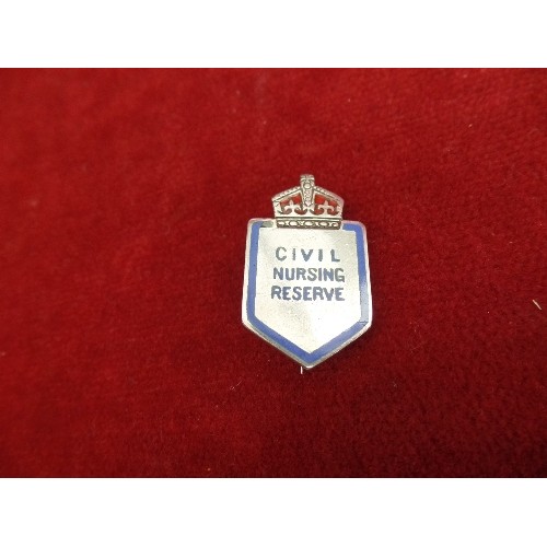 34 - VINTAGE STERLING SILVER AND ENAMEL CIVIL NURSING RESERVE PIN BADGE AND A SILVER GILT & ENAMEL BLOOD ... 