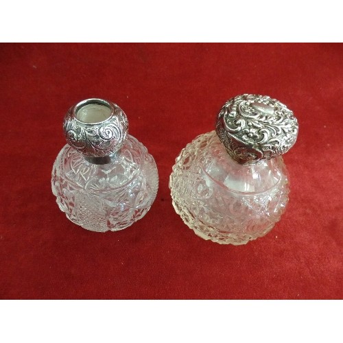 14 - TWO EARLY 20TH CENTURY CUT GLASS SCENT BOTTLES WITH SILVER TOPS, BIRM 1901, MILLER BROS AND BIRM 191... 