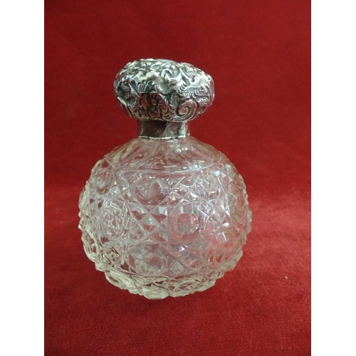 14 - TWO EARLY 20TH CENTURY CUT GLASS SCENT BOTTLES WITH SILVER TOPS, BIRM 1901, MILLER BROS AND BIRM 191... 