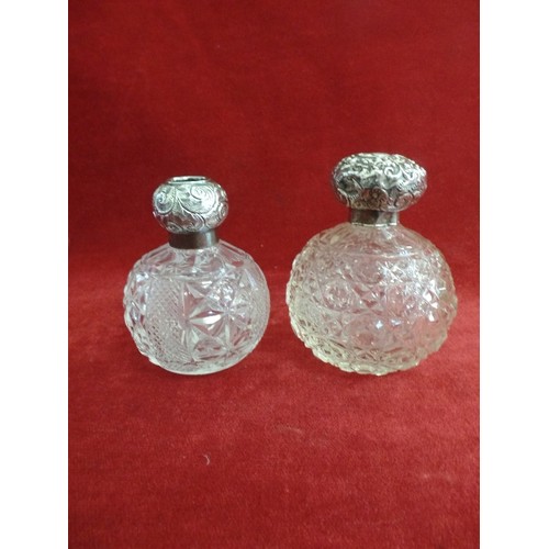 14 - TWO EARLY 20TH CENTURY CUT GLASS SCENT BOTTLES WITH SILVER TOPS, BIRM 1901, MILLER BROS AND BIRM 191... 