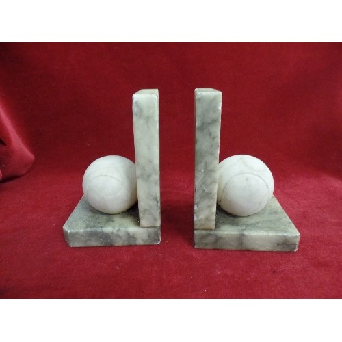 132 - A PAIR OF 20TH CENTURY ITALIAN CARVED ALABASTER TENNIS BALL BOOKENDS